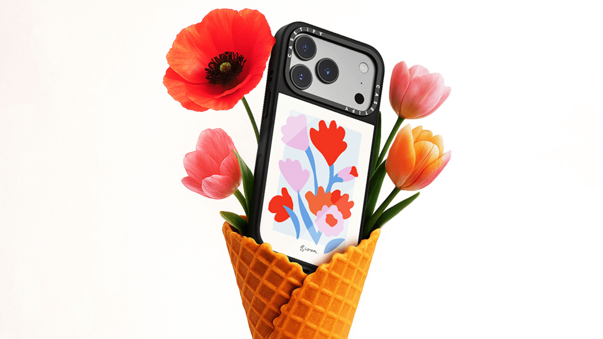 Phone in floral case with flowers in waffle cone.