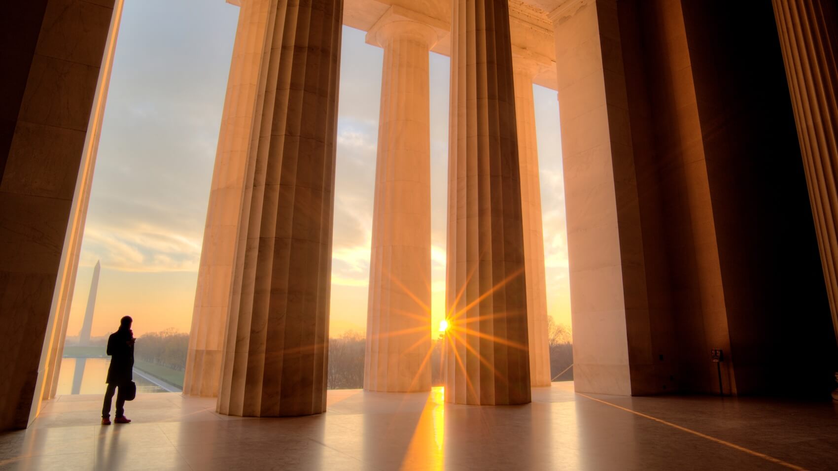 Person at Lincoln Memorial, sunset, Washington Mon.