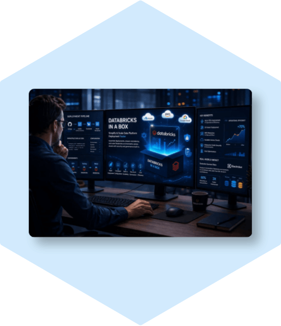Man using multiple monitors for Databricks data.