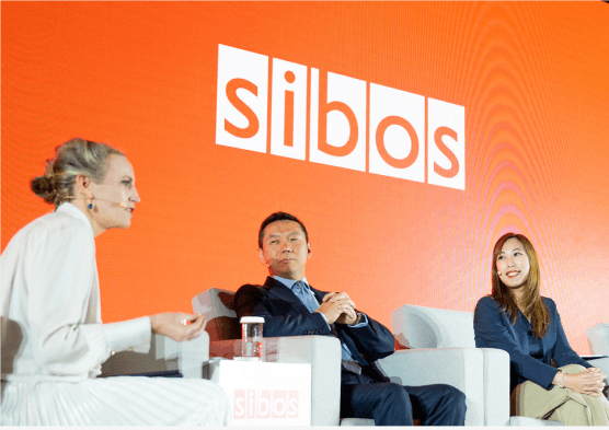 Panel discussion with 3 speakers at Sibos event.
