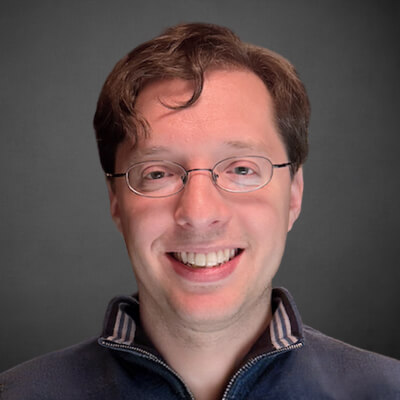Smiling man with glasses