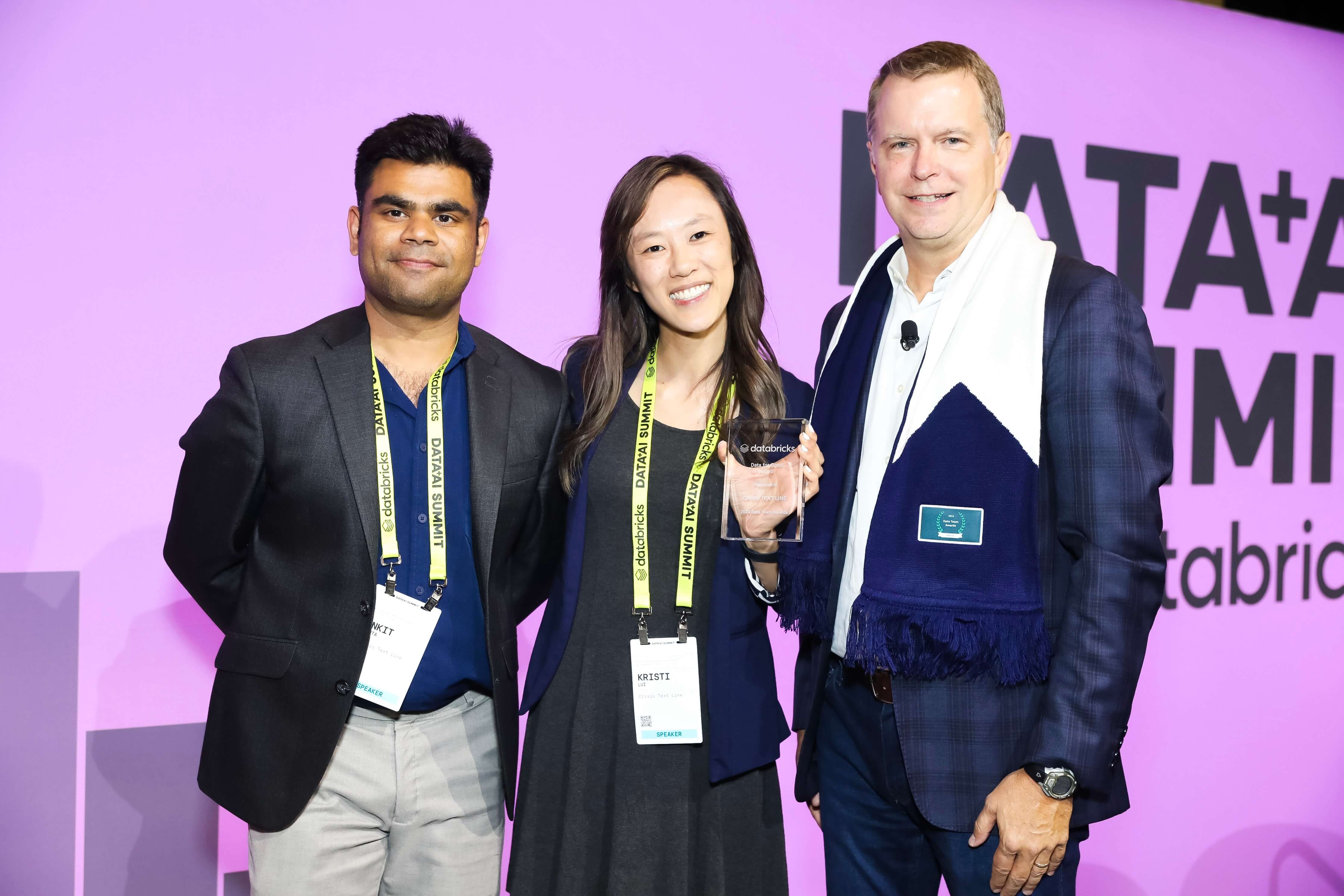Crisis Text Line data team posing with the Data for Good award.