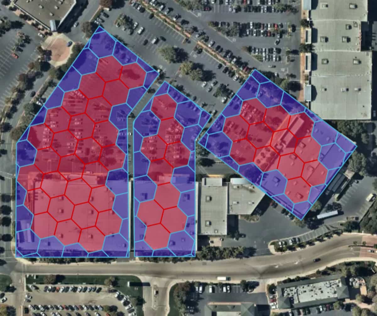 Figure 2: Geofence polygons from Figure 1 showing contained H3 cells (in red) and the derived boundary chips (in blue).